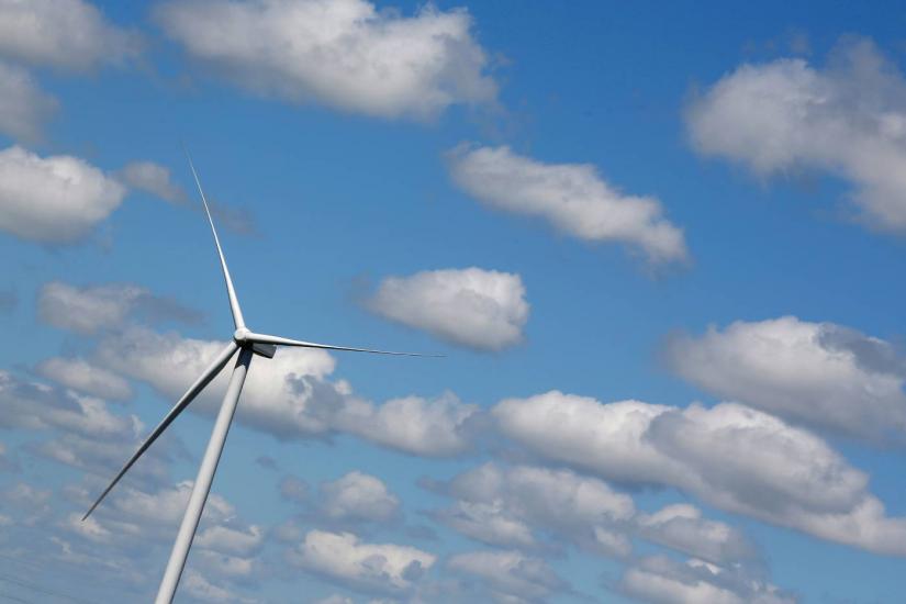 A power-generating wind turbine is seen in Saint-Laurent-Des-Eaux near Orleans, France, June 17, 2019. REUTERS