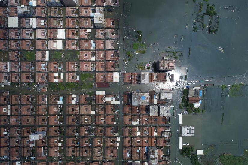 Residential houses submerged in floodwaters following heavy rainfall are seen at a town in Shantou, Guangdong province, China September 2, 2018. REUTERS/File Photo