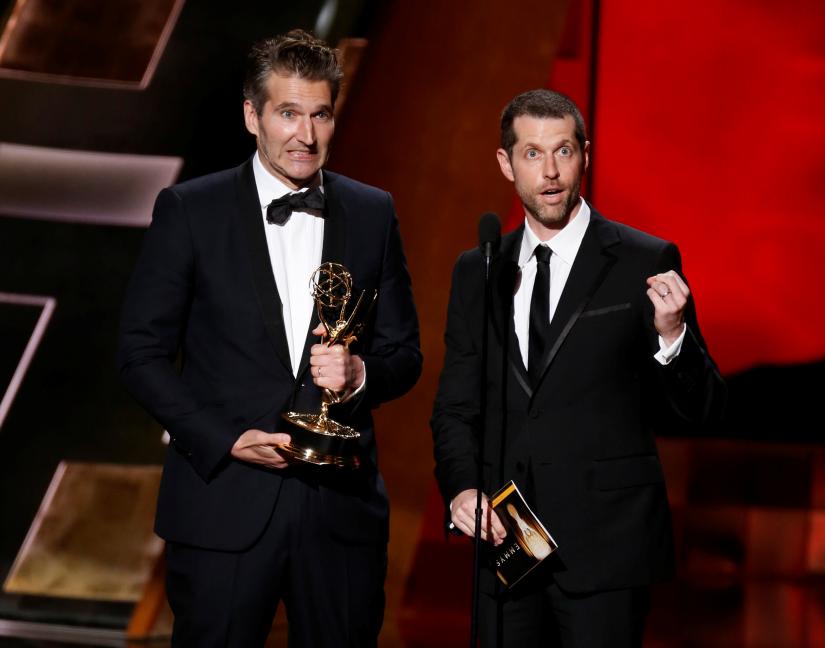 FILE PHOTO: David Benioff (L) and D.B. Weiss accept the award for Outstanding Writing For A Drama Series for HBO`s `Game of Thrones` at the 67th Primetime Emmy Awards in Los Angeles, California September 20, 2015. REUTERS