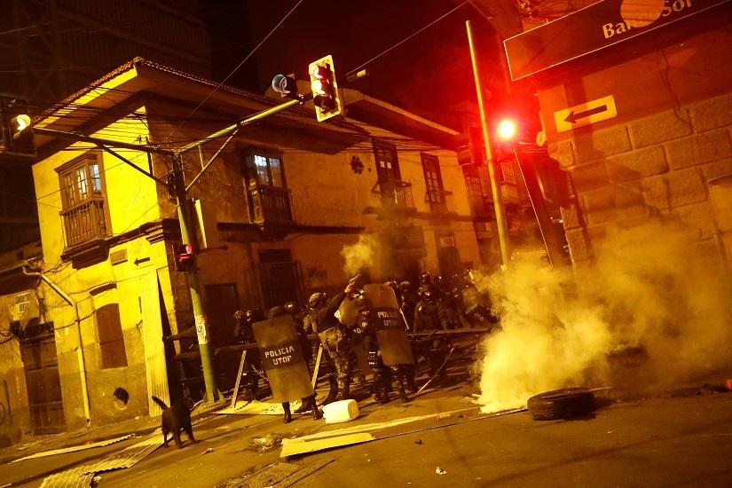 Police fire tear gas during clashes between protesters against Bolivia`s President Evo Morales and government supporters, in La Paz, Bolivia Nov 7, 2019. REUTERS
