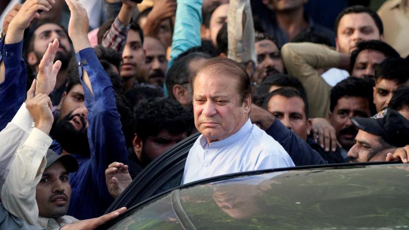 FILE PHOTO: Former Prime Minister Nawaz Sharif, who was temporarily released from prison, arrives to attend funeral services for his wife, Kulsoom, in Lahore, Pakistan Sept 14, 2018. REUTERS