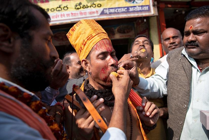 Hindu devotees celebrate after Supreme Court`s verdict on a disputed religious site, in Ayodhya, India, Nov 9, 2019. REUTERS