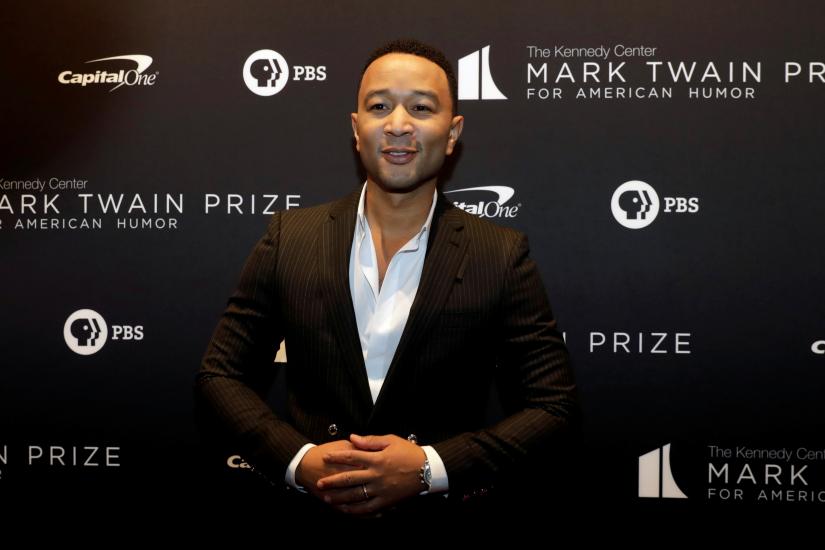 FILE PHOTO: John Legend arrives ahead of comedian Dave Chappelle receiving the Mark Twain Prize for American Humor at the Kennedy Center in Washington, U.S., October 27, 2019. REUTERS/File Photo