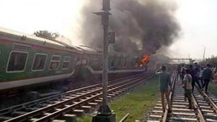 This photo shows bogies of Rangpur Express train have derailed and caught fire in Ullapara of Sirajganj on Thursday, Nov 14, 2019