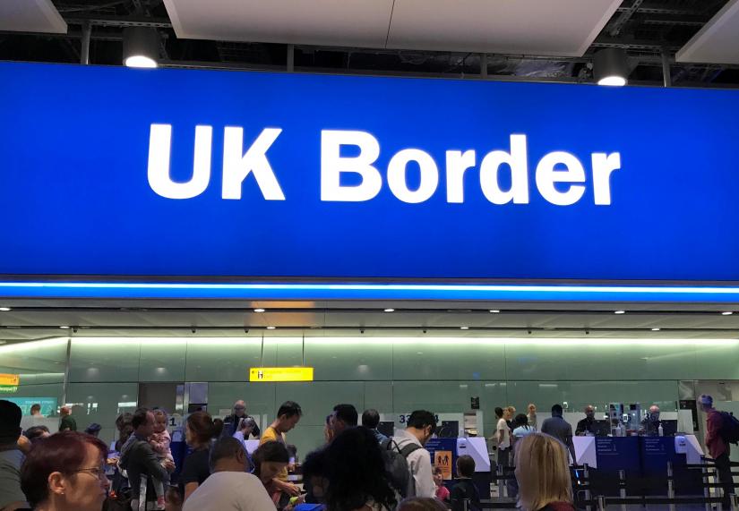 Signage is seen at the UK border control point at the arrivals area of Heathrow Airport, London, September 3, 2018. Picture taken on September 3. REUTERS