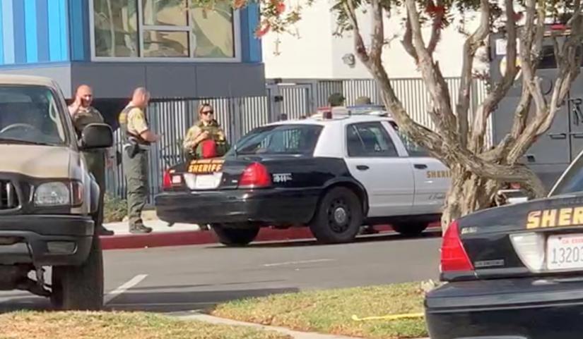 Sheriffs stand outside Saugus High School after a shooting, in Santa Clarita, California, U.S., November 14, 2019 in this still image obtained from social media video. KHTS Radio via REUTERS