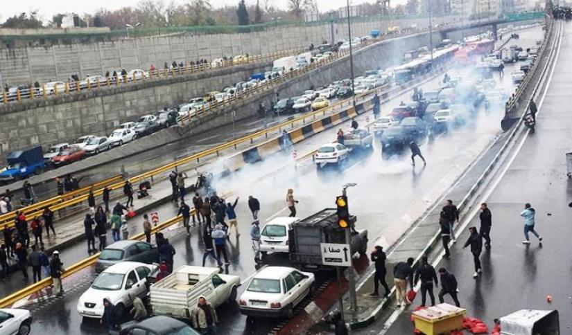 Protests broke out across Iran against gasoline prices hike, protestors block roads entering, exiting Tehran. WANA via REUTERS