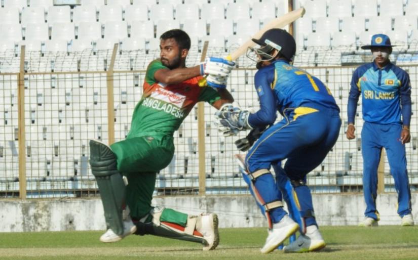 Bangladesh`s Towhid Hridoy plays a shot against Sri Lanka at Zahur Ahmed Chowdhury Stadium on Sunday (Nov 17).