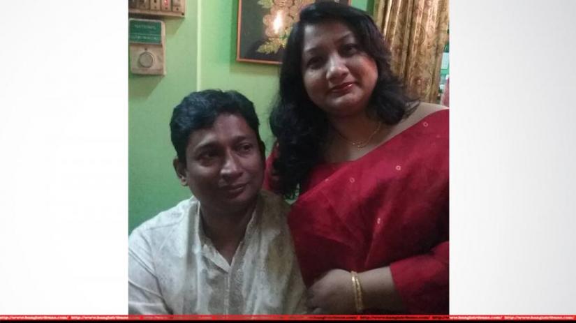 AKM Kamrul Islam with his wife.