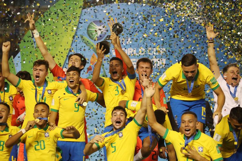FIFA Under 17 World Cup - Final - Brazil v Mexico - Bezerrao Stadium, Brasilia, Brazil - November 17, 2019 Brazil`s Henri celebrates with the trophy after winning the FIFA Under 17 World Cup REUTERS