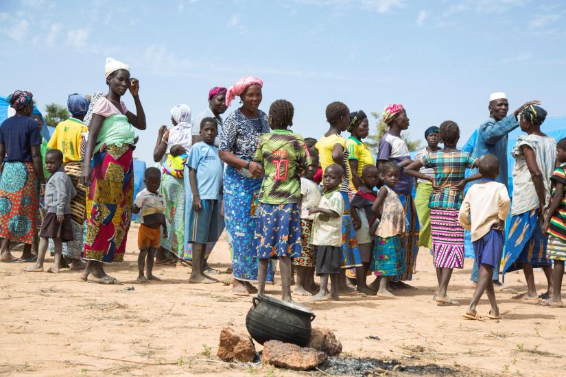 A group of internally displaced persons (IDPs) gather in the middle of a camp in Pissila, Burkina Faso, November 13, 2019. Picture taken November 13, 2019. WFP/Handout via REUTERS