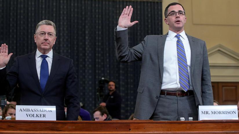 Former US special envoy to Ukraine Kurt Volker; and Tim Morrison, former senior director for European and Russian affairs on the National Security Council, are sworn in to testify before a House Intelligence Committee hearing as part of the impeachment inquiry into U.S. President Donald Trump on Capitol Hill in Washington, U.S., November 19, 1019. REUTERS