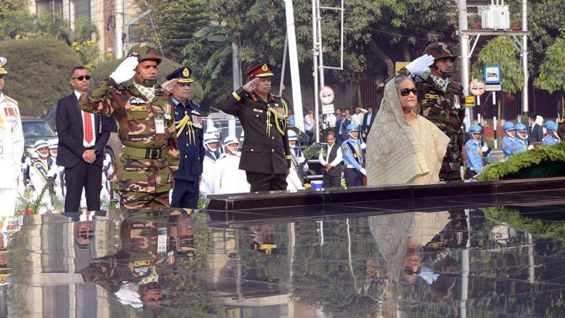 Prime Minister Sheikh Hasina pays her tribute to the martyred members of Army, Navy and Air Forces, of the Liberation War, on the occasion of Armed Forces Day, at Shikha Anirban, Dhaka Cantonment, on Wednesday, November 21, 2019. PID