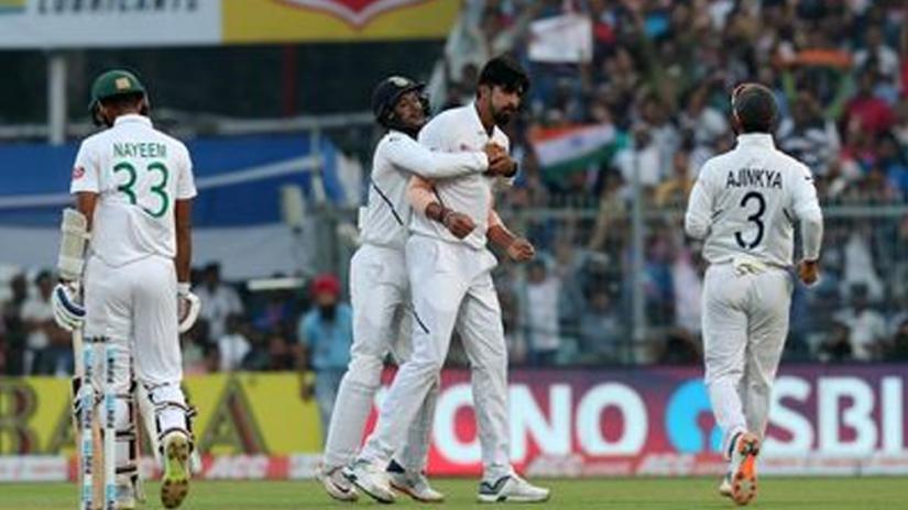 Ishant Sharma of India celebrates the wicket of Nayeem Hasan of Bangladesh during second Test first day on Nov 22