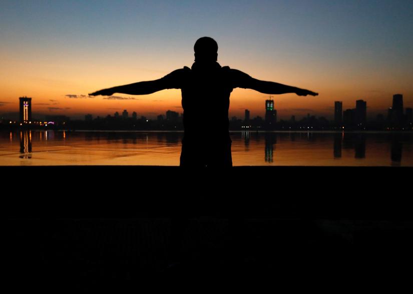 A man exercises early in the morning along the Arabian Sea in Mumbai, India, December 21, 2017. REUTERS/File Photo