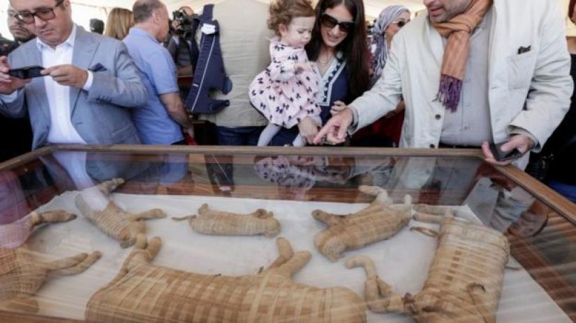 Tourists showed up in large numbers to see the artefacts on display. PHOTO: Reuters