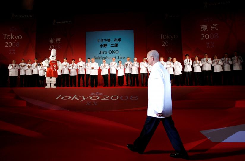 FILE PHOTO : Owner and chef Jiro Ono of Sukiyabashi Jiro joins other three-star chefs from all over the world after being awarded with the Michelin three stars rating in `Michelin Guide Tokyo 2008,` at a party for the publication of the guide in Tokyo November 19, 2007. REUTERS