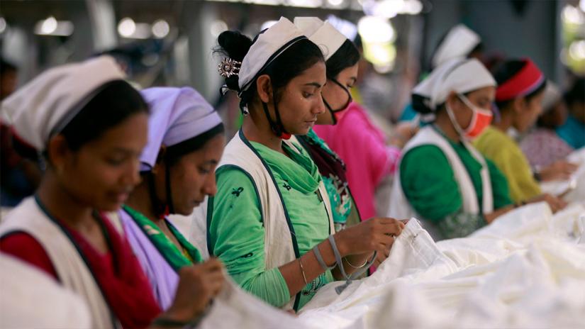 Women work at a garment factory inside the Dhaka Export Processing Zone (DEPZ) in Savar. REUTERS FILE PHOTO