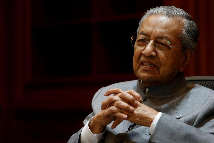 Malaysia`s Prime Minister Mahathir Mohamad speaks during an interview with Reuters in Putrajaya, Malaysia June 19, 2018. REUTERS