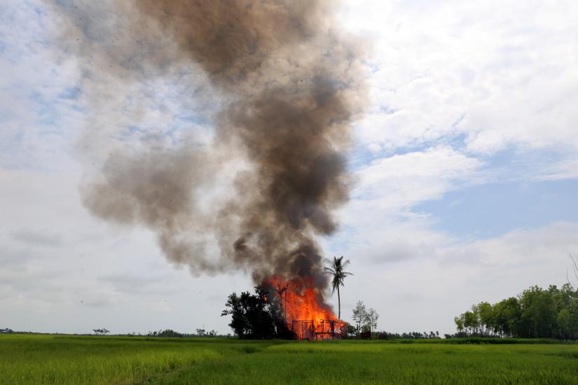 A house is seen on fire in Gawduthar village, Maungdaw township, in the north of Rakhine state, Myanmar. REUTERS FILE PHOTO