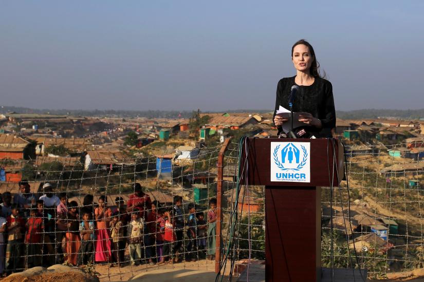 FILE PHOTO: Actor Angelina Jolie joins in a press briefing as she visits Kutupalong refugee camp in Cox`s Bazar, Bangladesh, Feb 5, 2018. REUTERS