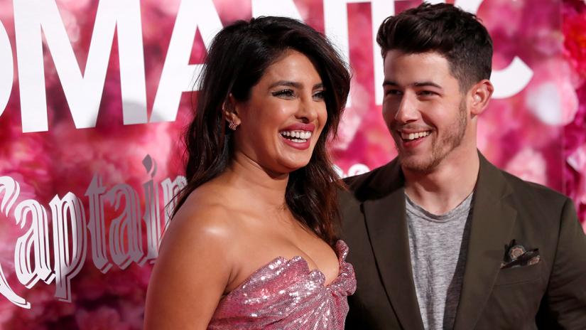 Cast member Priyanka Chopra and her husband Nick Jonas pose at the premiere for the movie `Isn`t It Romantic` in Los Angeles, California, US, Feb 11, 2019. REUTERS/File Photo