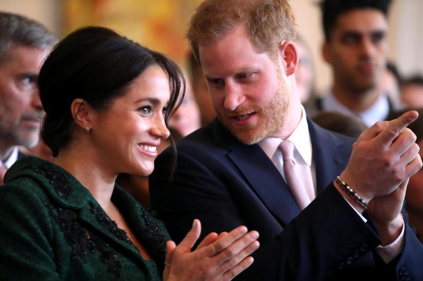 Britain`s Prince Harry and Meghan, Duchess of Sussex attend a Commonwealth Day youth event at Canada House in London, Britain, March 11, 2019. REUTERS