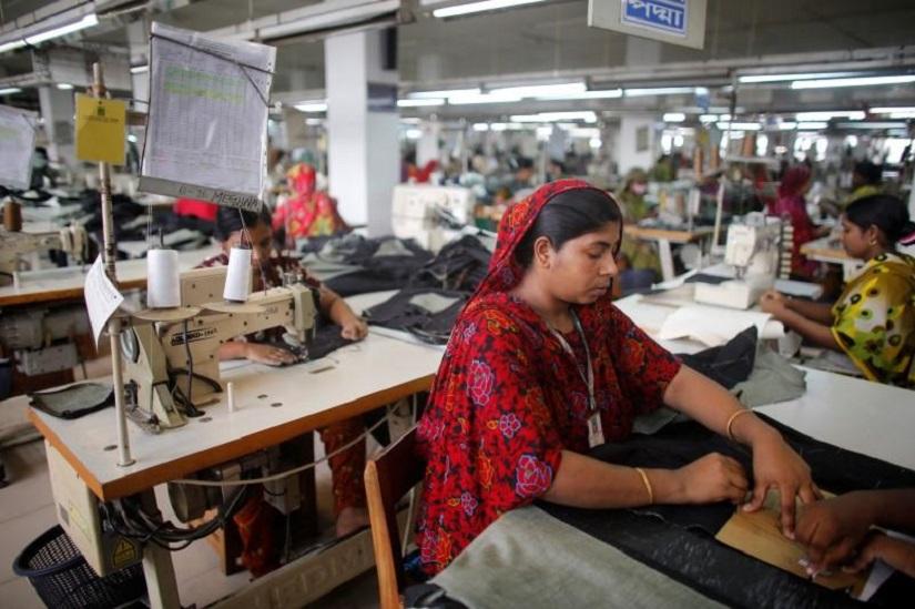A worker works in a factory of Ananta Garments Ltd in Savar June 10, 2014. REUTERS/File Photo