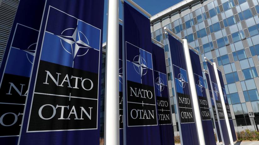 Banners displaying the NATO logo are placed at the entrance of new NATO headquarters during the move to the new building, in Brussels, Belgium Apr 19, 2018. REUTERS/File Photo