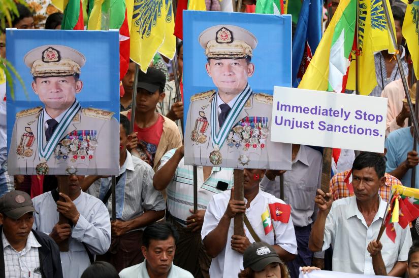Pro-military demonstrators march to protest the U.S. sanctions imposed on Senior General Min Aung Hlaing in Yangon, Myanmar, August 3, 2019. REUTERS