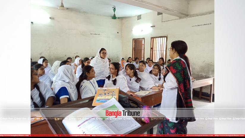 FILE PHOTO: A teacher takes class at Dhaka`s Ideal School and College.