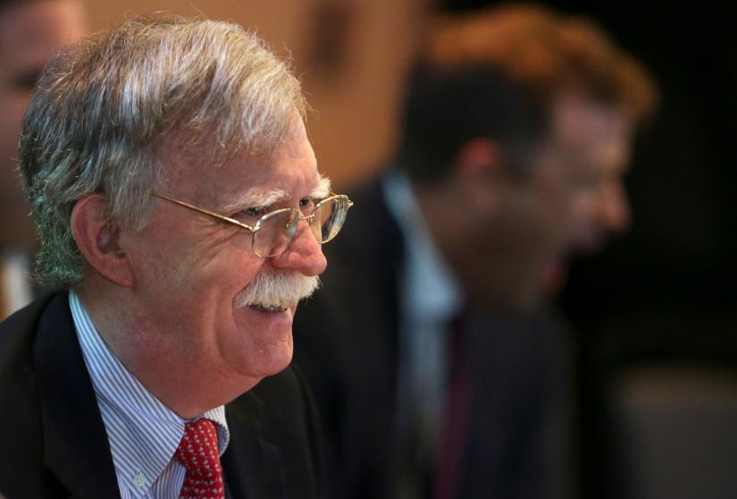 US National Security Adviser John Bolton reacts as he attends a summit to discuss the political crisis in Venezuela, in Lima, Peru, August 6, 2019. REUTERS