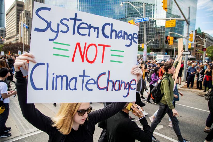 People take part in a climate change strike in Toronto, Ontario, Canada September 27, 2019. REUTERS