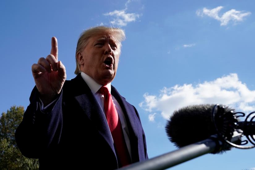U.S. President Donald Trump speaks to the media on the South Lawn of the White House in Washington upon his return from New York, U.S., November 3, 2019. REUTERS