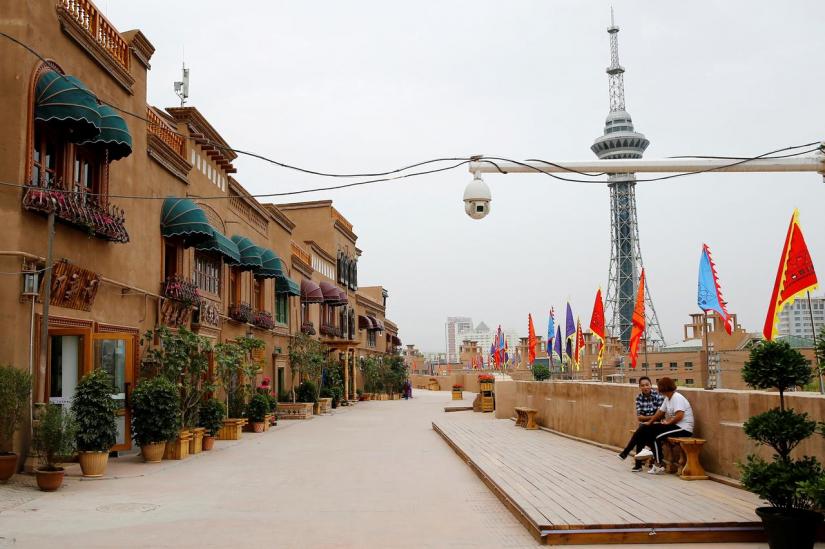 FILE PHOTO: A security camera is placed in a renovated section of the Old City in Kashgar, Xinjiang Uighur Autonomous Region, China Sept 6, 2018. REUTERS