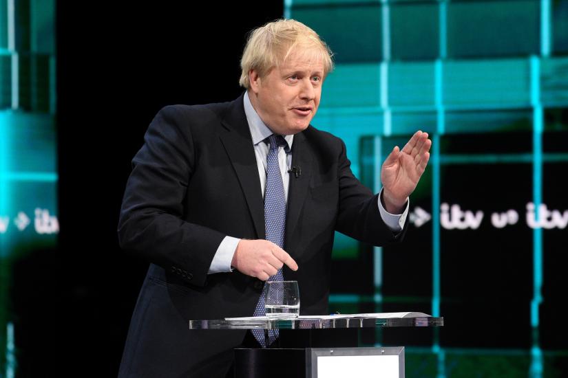 Conservative leader Boris Johnson speaks during a televised debate with Labour leader Jeremy Corbyn ahead of general election in London, Britain, November 19, 2019. ITV/Handout via REUTERS