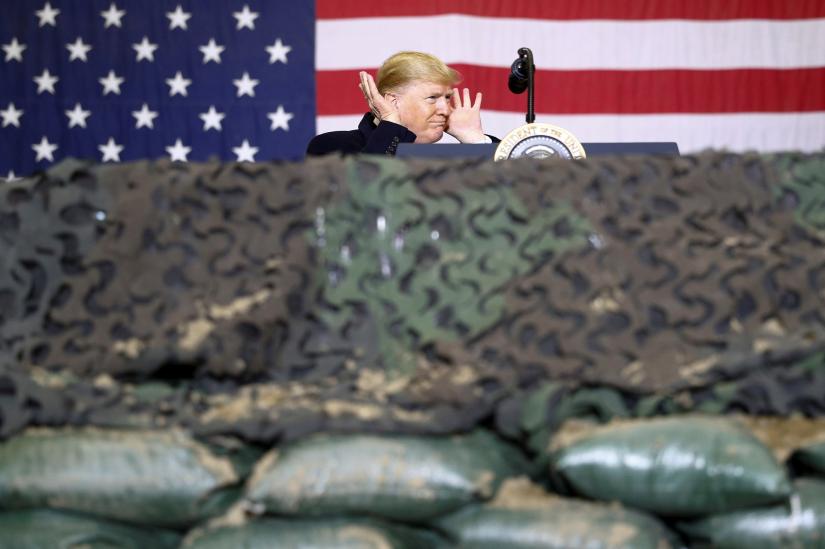 U.S. President Donald Trump delivers remarks to U.S. troops in an unannounced visit to Bagram Air Base, Afghanistan, November 28, 2019. REUTERS