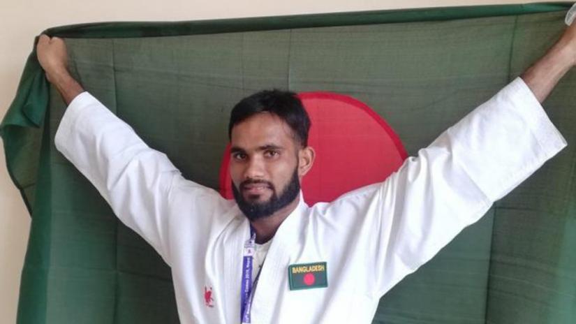 Mohammad Al Amin clinched gold in the men`s 60kg kumite event in karate at Satdobato International Sports Complex in Kathmandu on Tuesday (Dec 3).