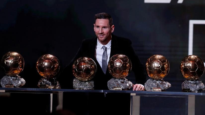 Soccer Football - The Ballon d’Or awards - Theatre du Chatelet, Paris, France - December 2, 2019 Barcelona`s Lionel Messi with his six Ballon d`Or trophies REUTERS