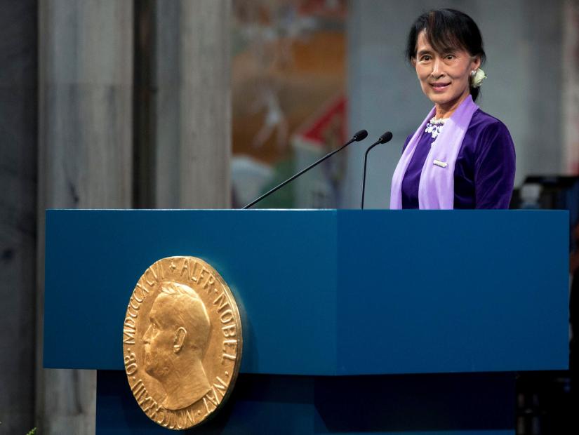 FILE PHOTO: Myanmar opposition leader Aung San Suu Kyi delivers her Nobel acceptance speech during a ceremony at Oslo`s City Hall, Norway June 16, 2012.Pool via REUTERS/File Photo