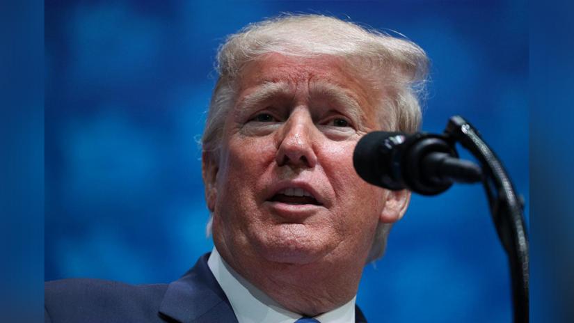 FILE PHOTO: US President Donald Trump delivers remarks at the Israeli American Council National Summit in Hollywood, Florida, US, Dec 7, 2019. REUTERS