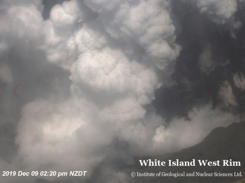 An aeriel view shows smoke billowing above the crater of Whakaari, also known as White Island, volcano as it erupts in New Zealand, Dec 9, 2019, in this image obtained via social media. GNS Science via REUTERS