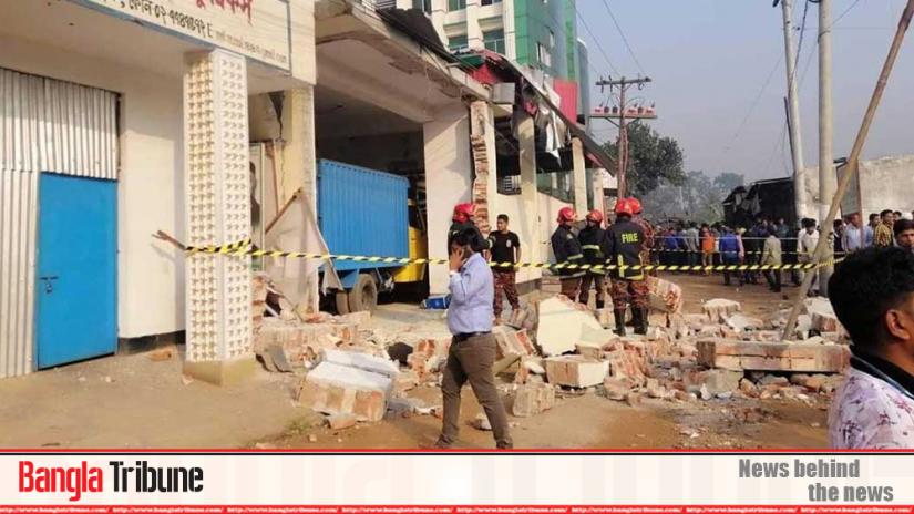 Fire service team secure the boiler explosion area at Ashulia on Tuesday (Dec 10).