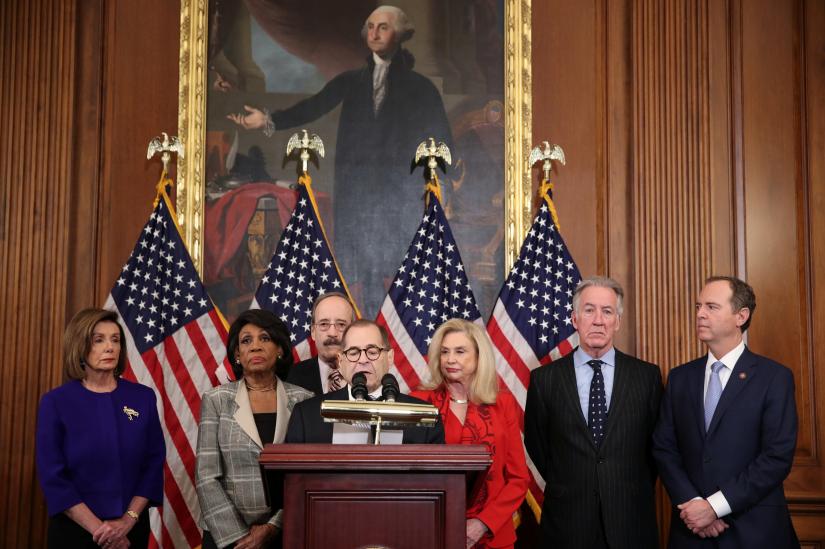 Judiciary Chairman Jerrold Nadler (D-NY) announces articles of impeachment against President Donald Trump at a news conference with Speaker of the House Nancy Pelosi, House Financial Services Chairwoman Maxine Waters (D-CA), House Foreign Affairs Chairman Eliot Engel (D-NY), House Oversight and Reform Chairwoman Carolyn Maloney (D-NY), House Ways and Means Committee Chairman Richard Neal (D-MA) and House Intelligence Chairman Adam Schiff (D-CA) on Capitol Hill in Washington, U.S., December 10, 2019. REUTERS