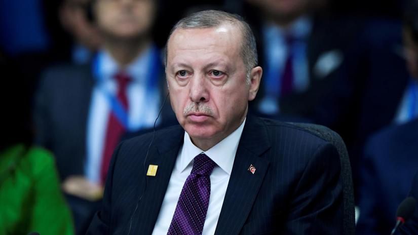 FILE PHOTO: Turkish President Recep Tayyip Erdogan attends a NATO leaders summit in Watford, Britain, Dec 4, 2019. REUTERS