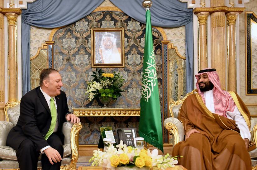 FILE PHOTO: U.S. Secretary of State Mike Pompeo takes part in a meeting with Saudi Arabia`s Crown Prince Mohammed bin Salman in Jeddah, Saudi Arabia, September 18, 2019.Pool via REUTERS