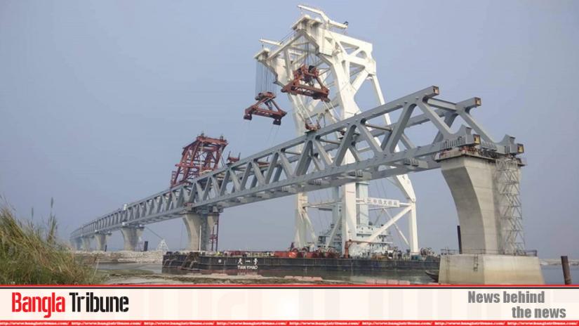 The 18th span of the 6.15-kilometre long Padma Bridge has been installed on the 17th and the 18th pillars at Mawa point in Munshiganj on Wednesday (Dec 11).