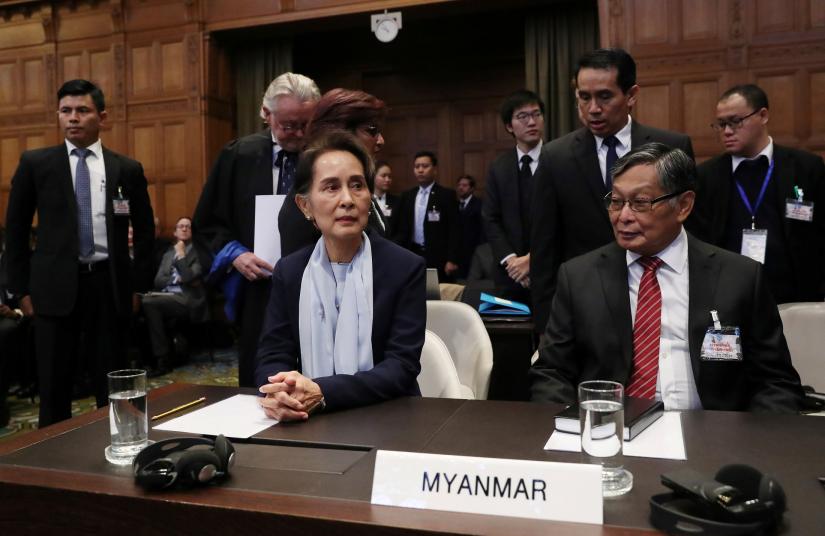 Myanmar`s leader Aung San Suu Kyi attends a hearing on the second day of hearings in a case filed by Gambia against Myanmar alleging genocide against the minority Muslim Rohingya population, at the International Court of Justice (ICJ) in The Hague, Netherlands December 11, 2019. REUTERS