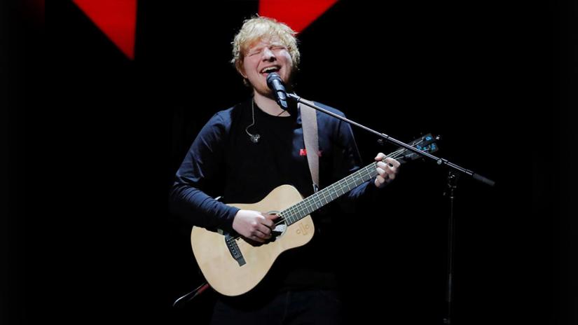 FILE PHOTO: Ed Sheeran performs during the 2017 Jingle Ball at Madison Square Garden in New York, US, Dec 8, 2017.REUTERS