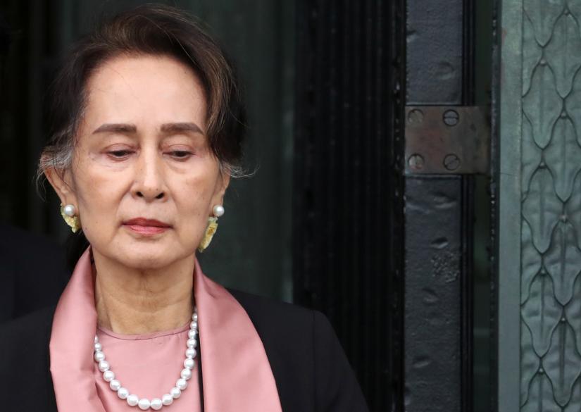 Myanmar`s leader Aung San Suu Kyi leaves after attending a hearing in a case filed by Gambia against Myanmar alleging genocide against the minority Muslim Rohingya population, at the International Court of Justice (ICJ) in The Hague, Netherlands December 10, 2019. REUTERS